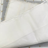 Bezug aus Seidenorgandis und abnehmbarer Spitze in Elfenbeinfarben. KLEINER JUJUGE PONZAC