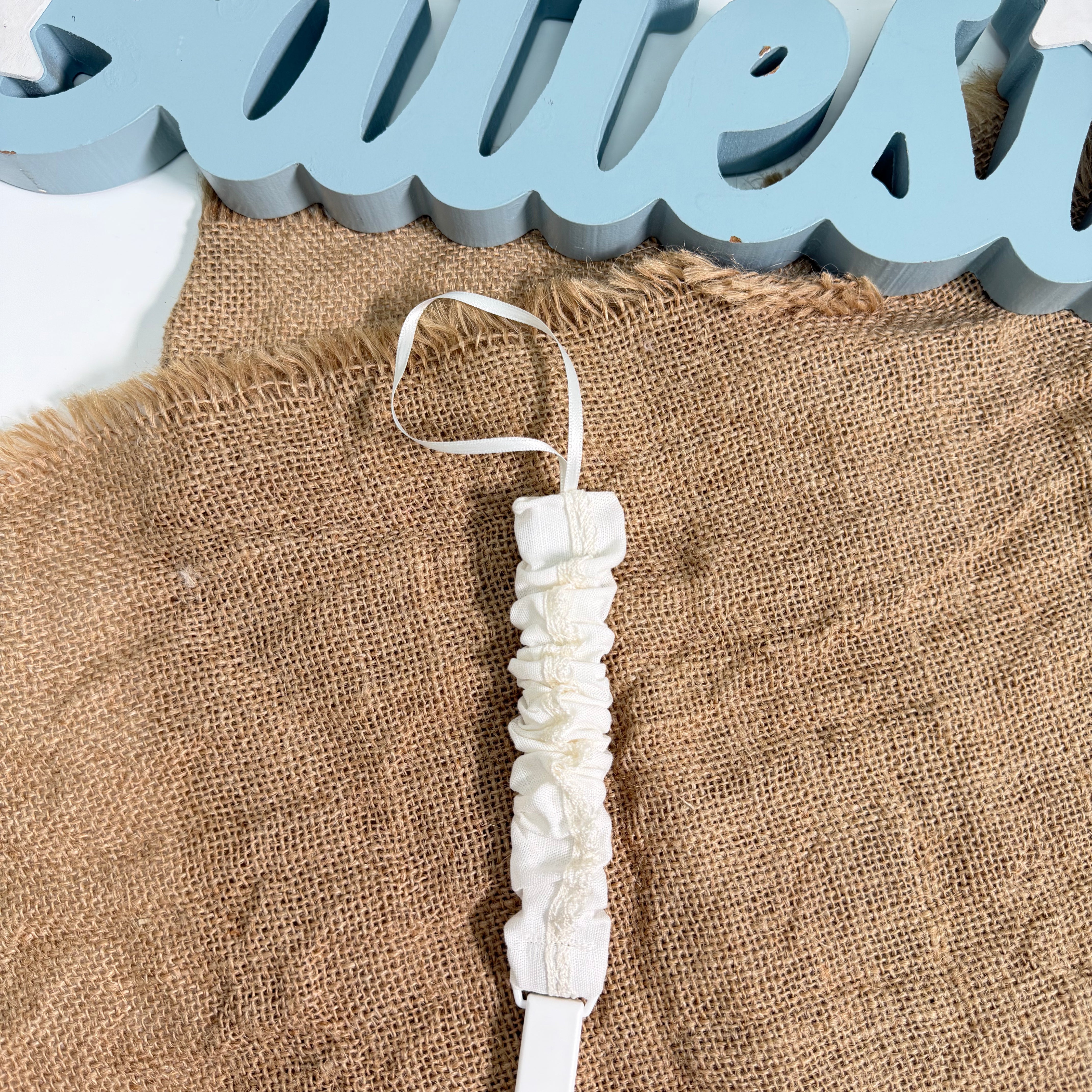 Portaciuccio In Lino Con Nastro Neonato PONTO POR PONTO 6503PC