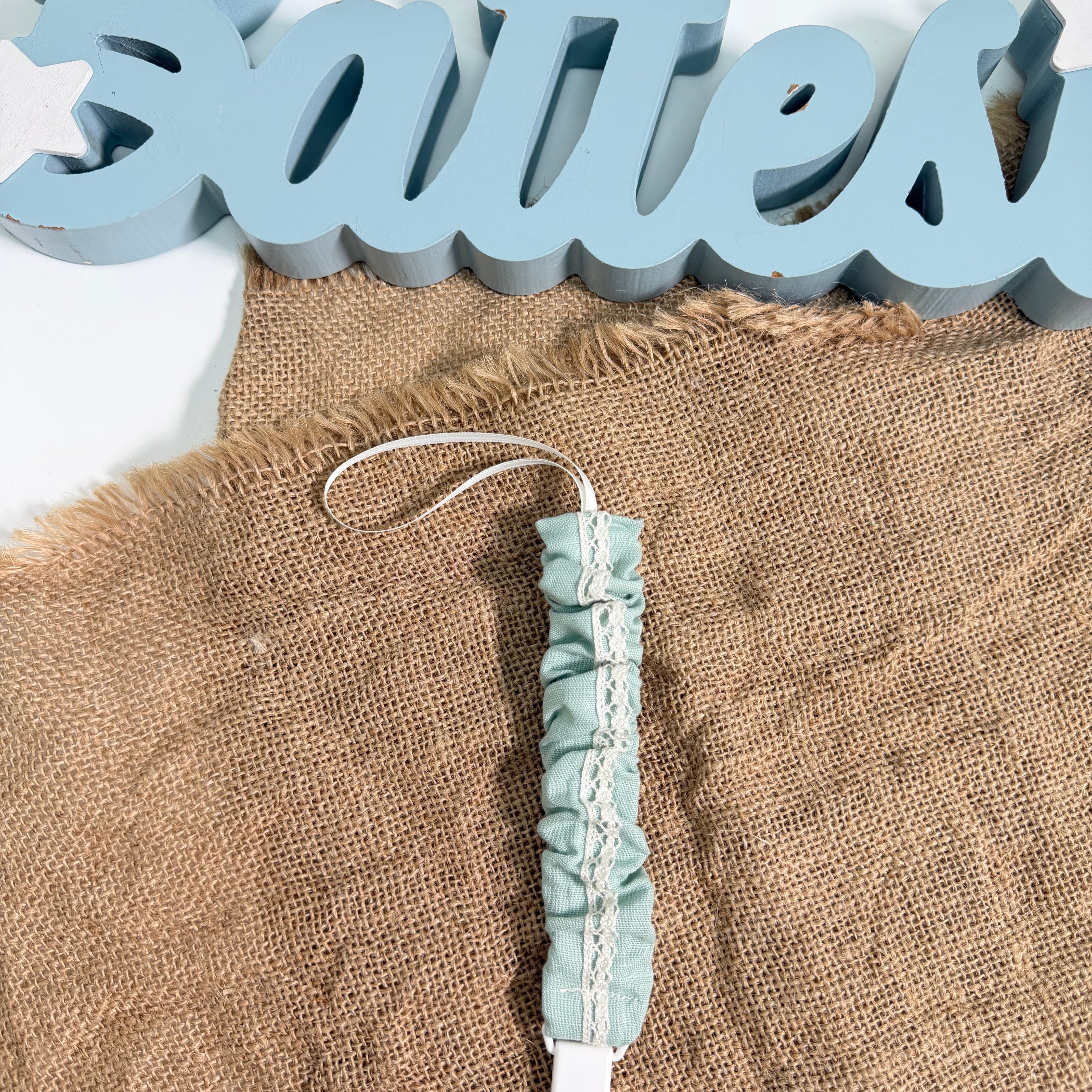 Portaciuccio In Lino Con Nastro Neonato PONTO POR PONTO 6503PC