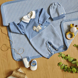 Einteiler aus 100 % Wolle mit Schaukelpferd für Neugeborene NINNAOH I23311TF